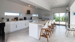 Casa, varias camas | Cocina privada