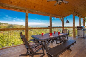 Outdoor dining - Luxury 6BR Cabin, Indoor Heated Pool, Theater Room, Mt. LeConte Views, Sleeps 18 (Gatlinburg)