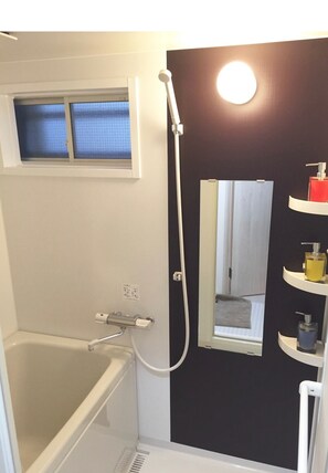 Three-Bed Room (Double Size Bed) | Bathroom | Separate bathtub and shower, slippers, bidet, towels - Private Vacation Home near Tamachi Station (Tokyo)