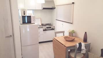 Three-Bed Room (Double Size Bed) | Private kitchenette | Fridge, microwave, stovetop, coffee/tea maker