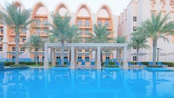 Outdoor pool, pool umbrellas, pool loungers