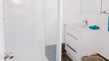 Shower, towels, soap, shampoo