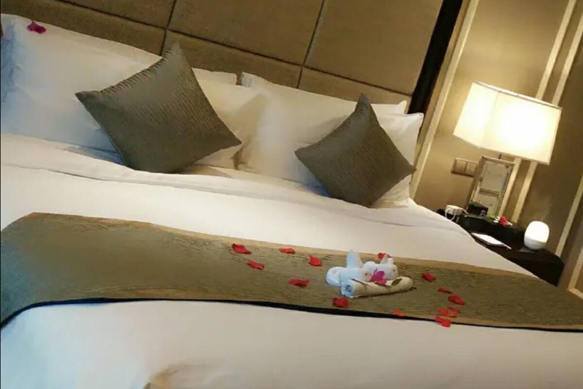 Suite Deluxe | Minibar, coffre-fort, bureau, rideaux d’obscurcissement