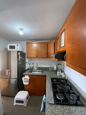 Fridge, microwave, oven, dishwasher