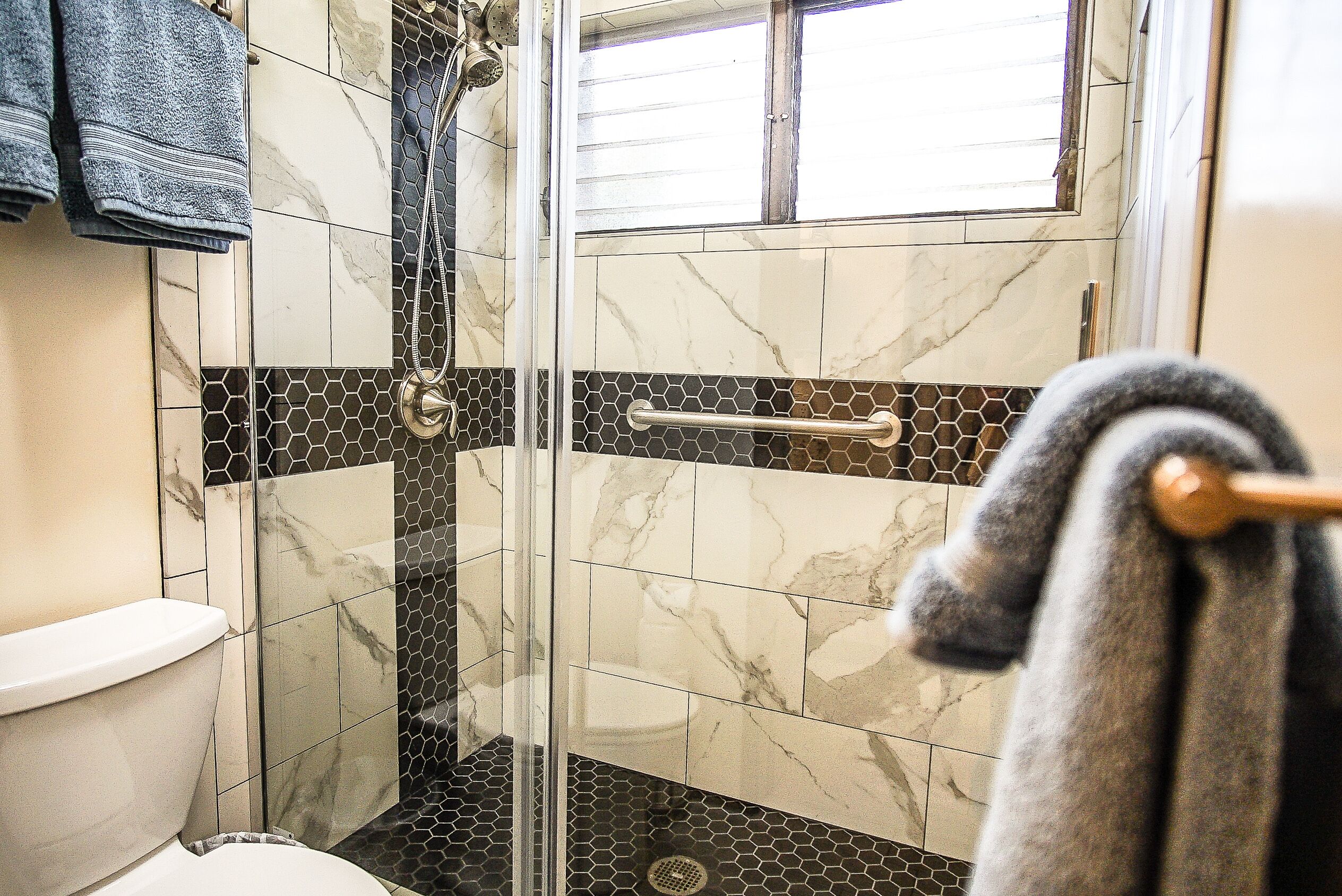 Hair dryer, towels, soap, shampoo