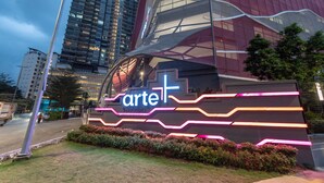 A modern building with a prominent 'arte' sign and a glass facade. - Comfort & Cozy Family Suite (Ampang)
