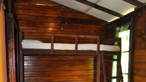 A bunk bed with a wooden floor and a ladder. - Rangala Hostel (Rangala)