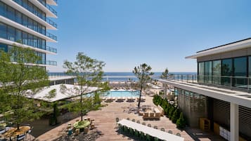 Seasonal outdoor pool, pool umbrellas, pool loungers