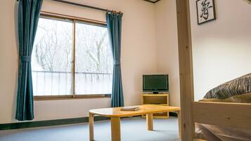 Couette en duvet d'oie, rideaux occultants, fer et planche Ă repasser