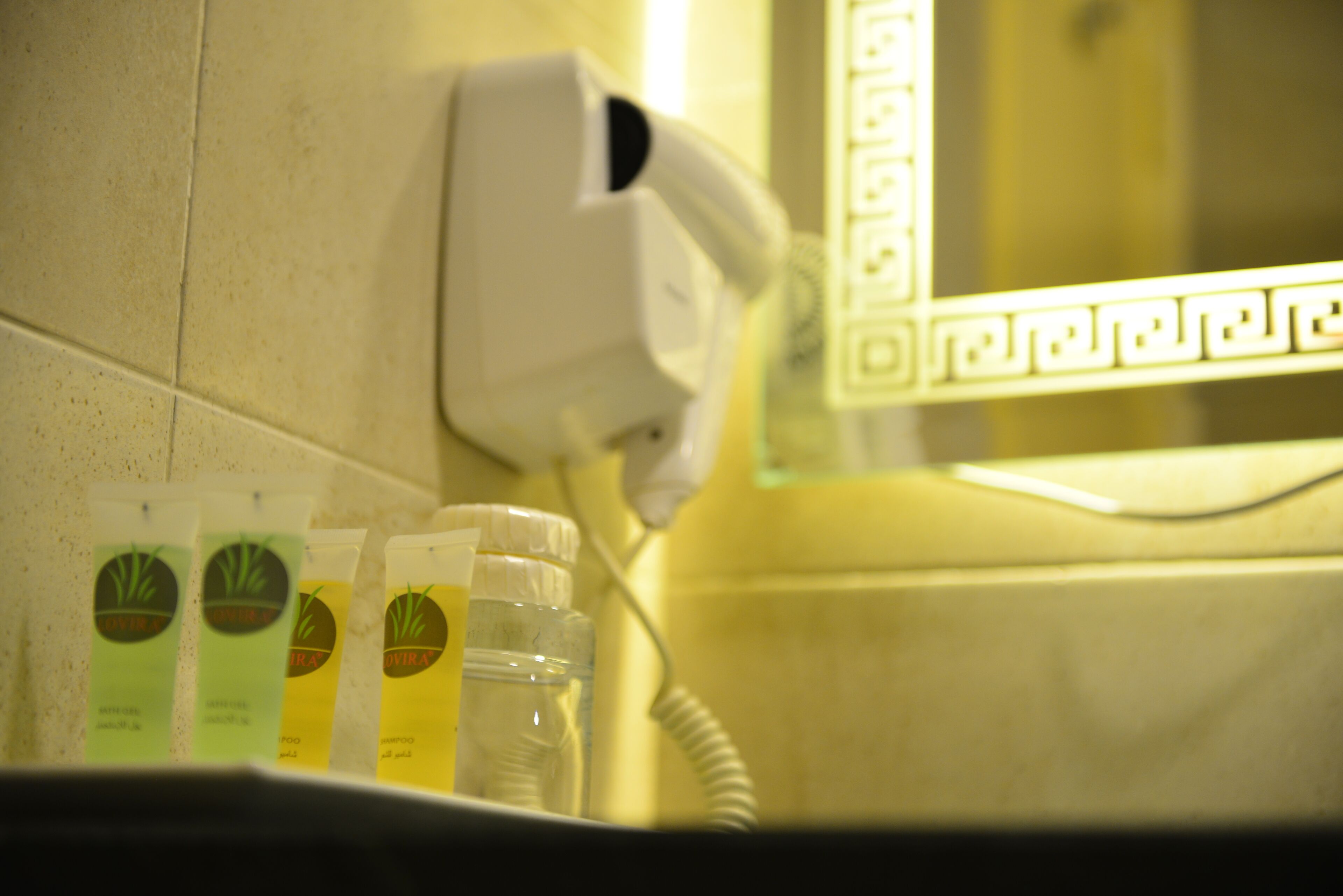 rainfall showerhead, hair dryer, bathrobes, slippers