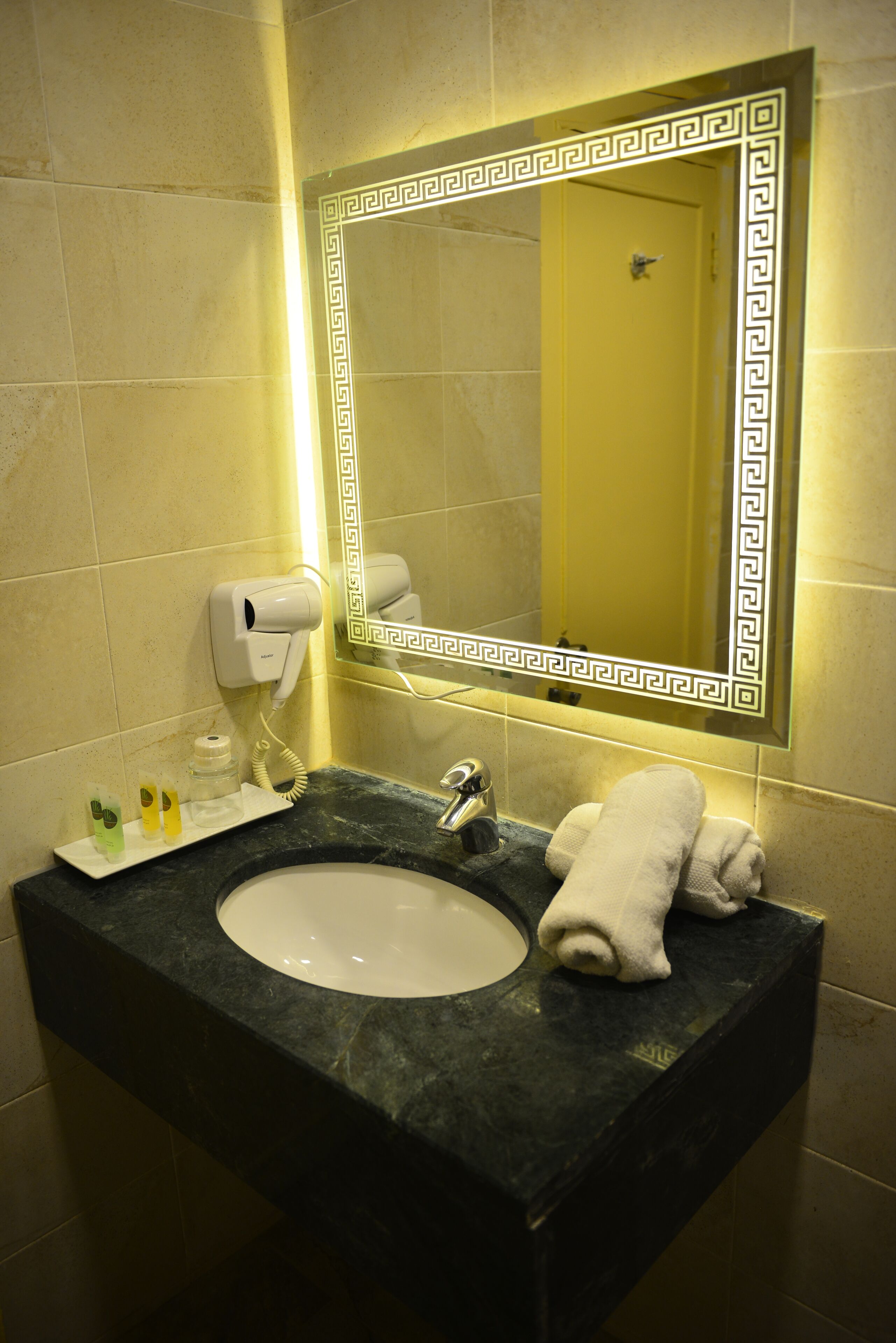 rainfall showerhead, hair dryer, bathrobes, slippers