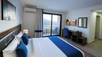 Doppia Superior, vista città | Biancheria da letto ipoallergenica, minibar con snack e bevande gratuite