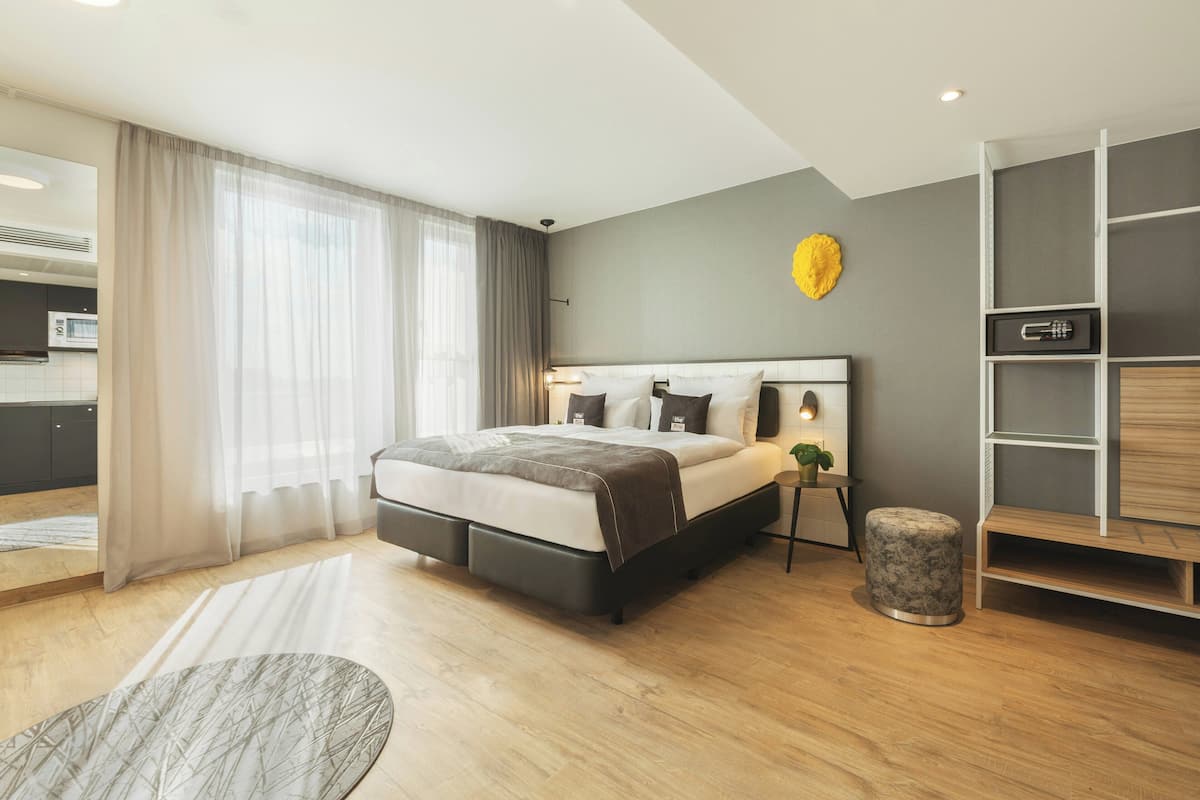 Premium Room, 1 Queen Bed with Sofa bed (Up to 3 Adults) | In-room safe, desk, laptop workspace, soundproofing