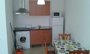Fridge, microwave, toaster, cookware/dishes/utensils