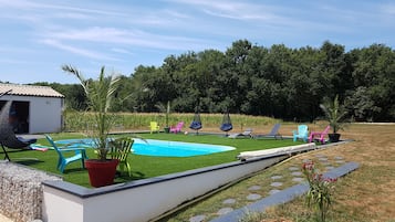 Seasonal outdoor pool, open 9:30 AM to 9:00 PM, sun loungers