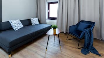 Royal Penthouse | Living room | Flat-screen TV