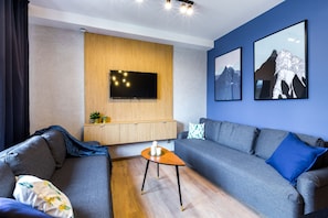Exclusive Apartment, 3 Bedrooms | Living room | Flat-screen TV - FriendHouse Apartments Szewska 7 (Kraków)