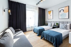 Superior-Apartment | Wohnzimmer | Flachbildfernseher