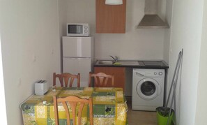 Fridge, microwave, toaster, cookware/dishes/utensils