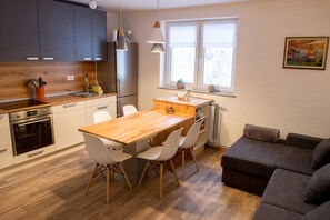 Family Apartment, Ground Floor | Living area | LCD TV, toys - Apartments Laznica (Cerkno)