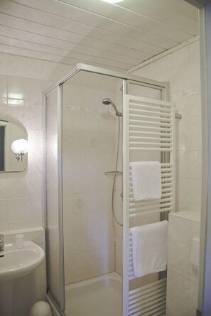 Shower, free toiletries, hair dryer, towels