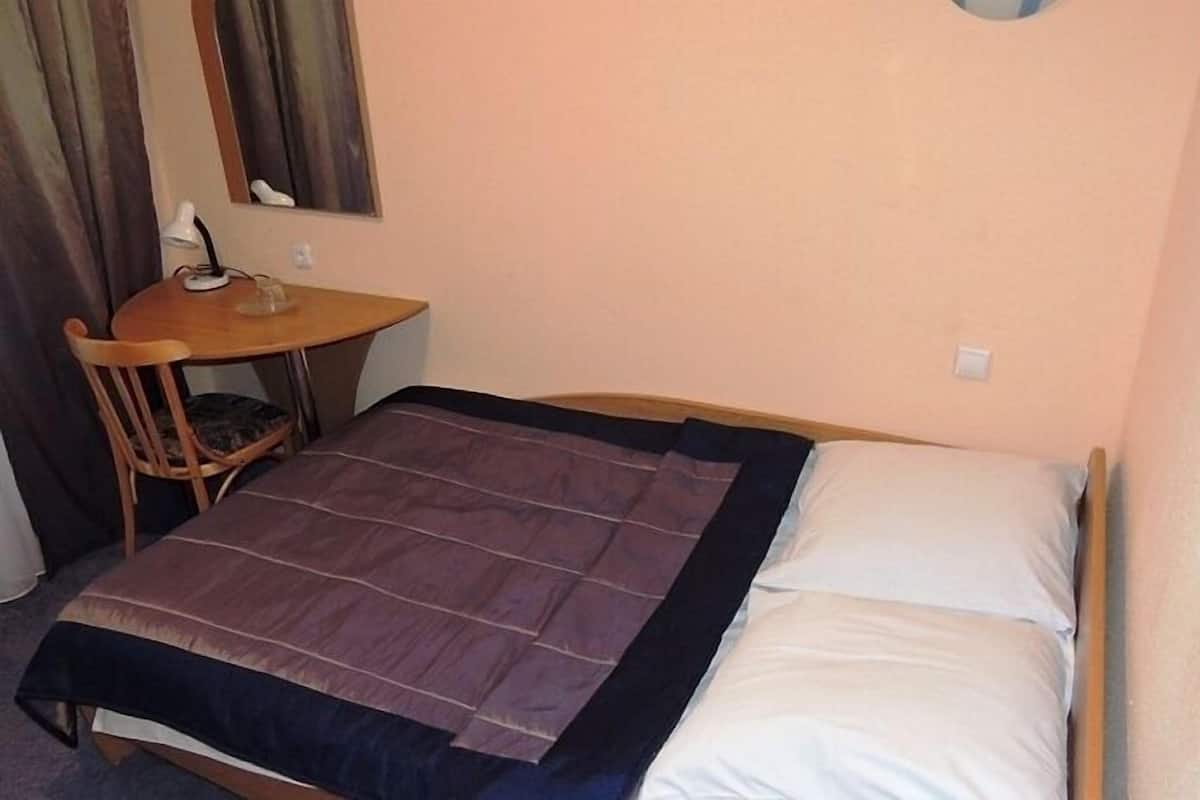 Standaard eenpersoonskamer | 1 slaapkamer, een bureau, gratis wifi, beddengoed