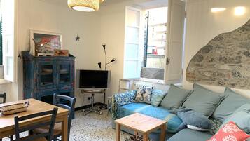 Apartment, 1 Double Bed with Sofa bed (Via Domenico Grillo 2) | Living room | 22-inch TV with digital channels