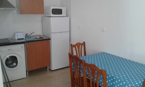 Fridge, microwave, toaster, cookware/dishes/utensils