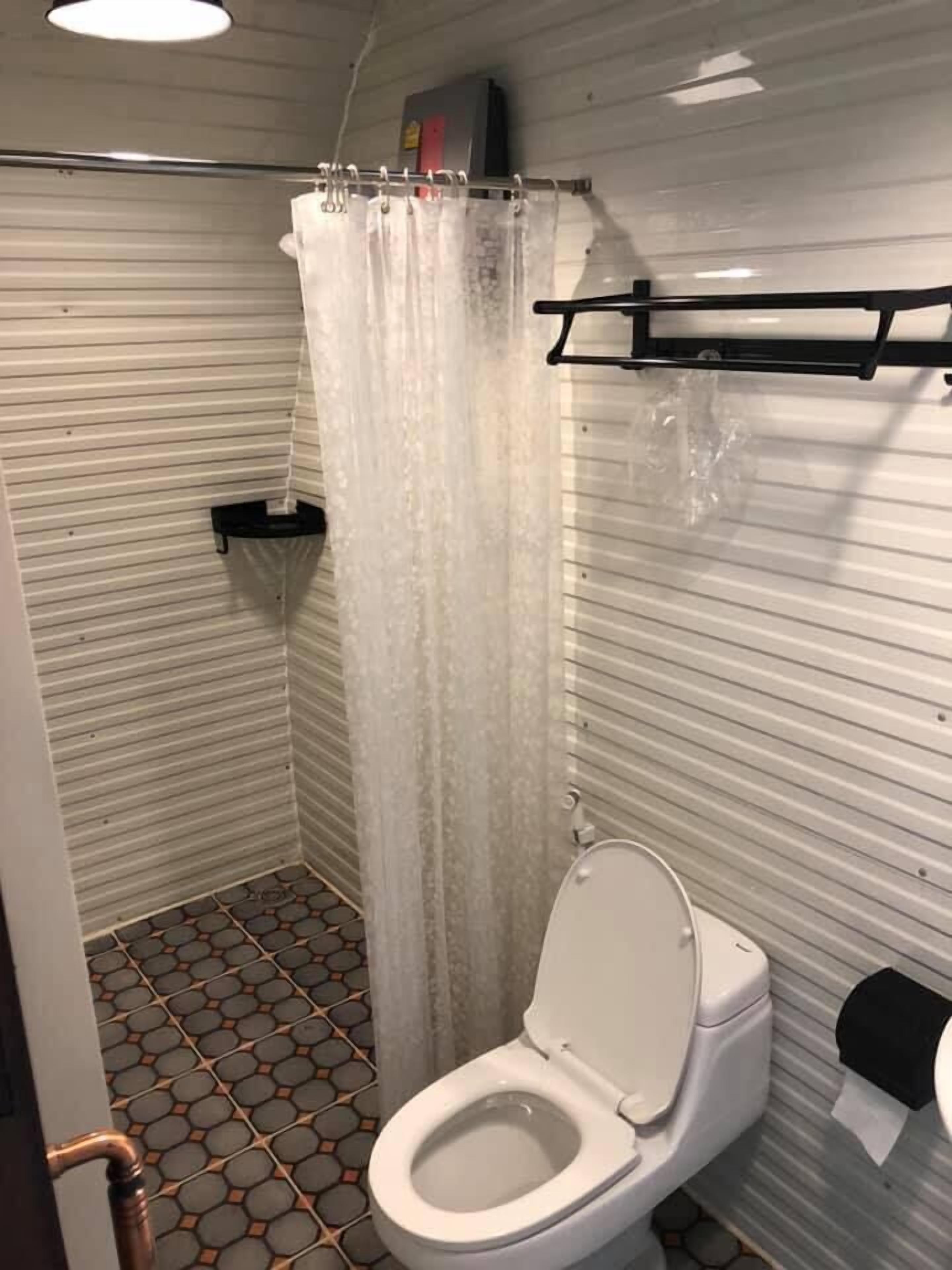 Shower, free toiletries, towels, soap