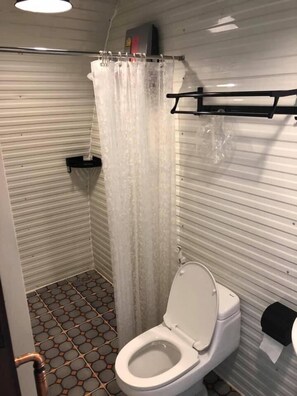 Shower, free toiletries, towels, soap