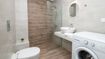 Family Apartment, 1 Bedroom | Bathroom | Shower, hair dryer, towels, soap