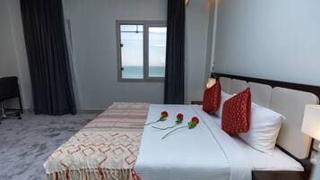 Chambre Double ou avec lits jumeaux, 1 grand lit 1 place, vue mer