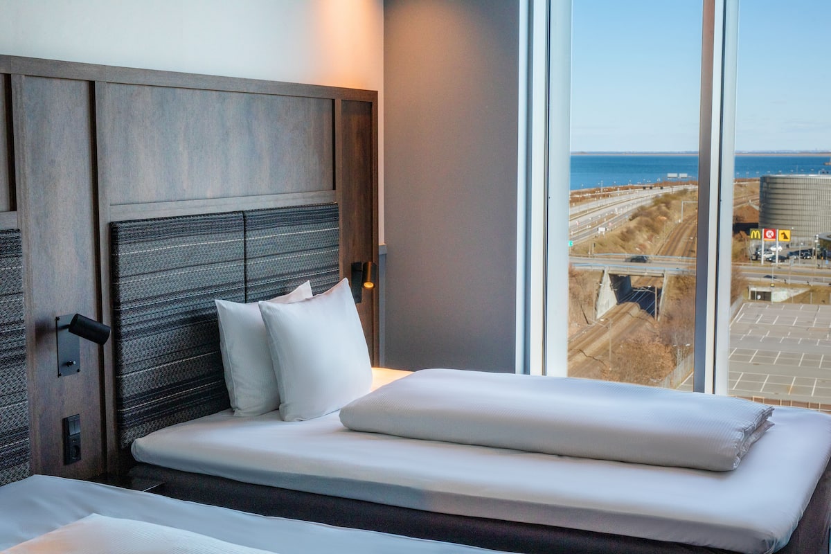 family room with 2 queen beds | blackout curtains, soundproofing, free wifi, bed sheets