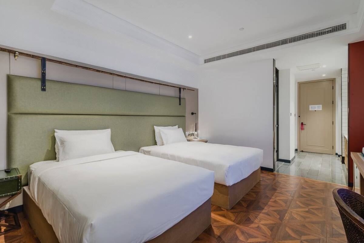 ห้องแฟมิลี่ | โต๊ะทำงาน, ผ้าม่านกันแสง, Wi-Fi ฟรี, ผ้าปูที่นอน