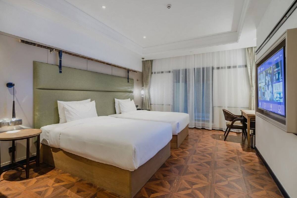 ห้องทวิน | โต๊ะทำงาน, ผ้าม่านกันแสง, Wi-Fi ฟรี, ผ้าปูที่นอน
