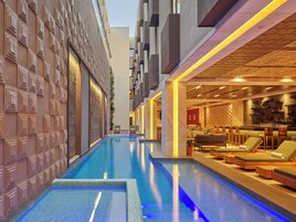 Indoor pool, open 7:00 AM to 8:00 PM, sun loungers