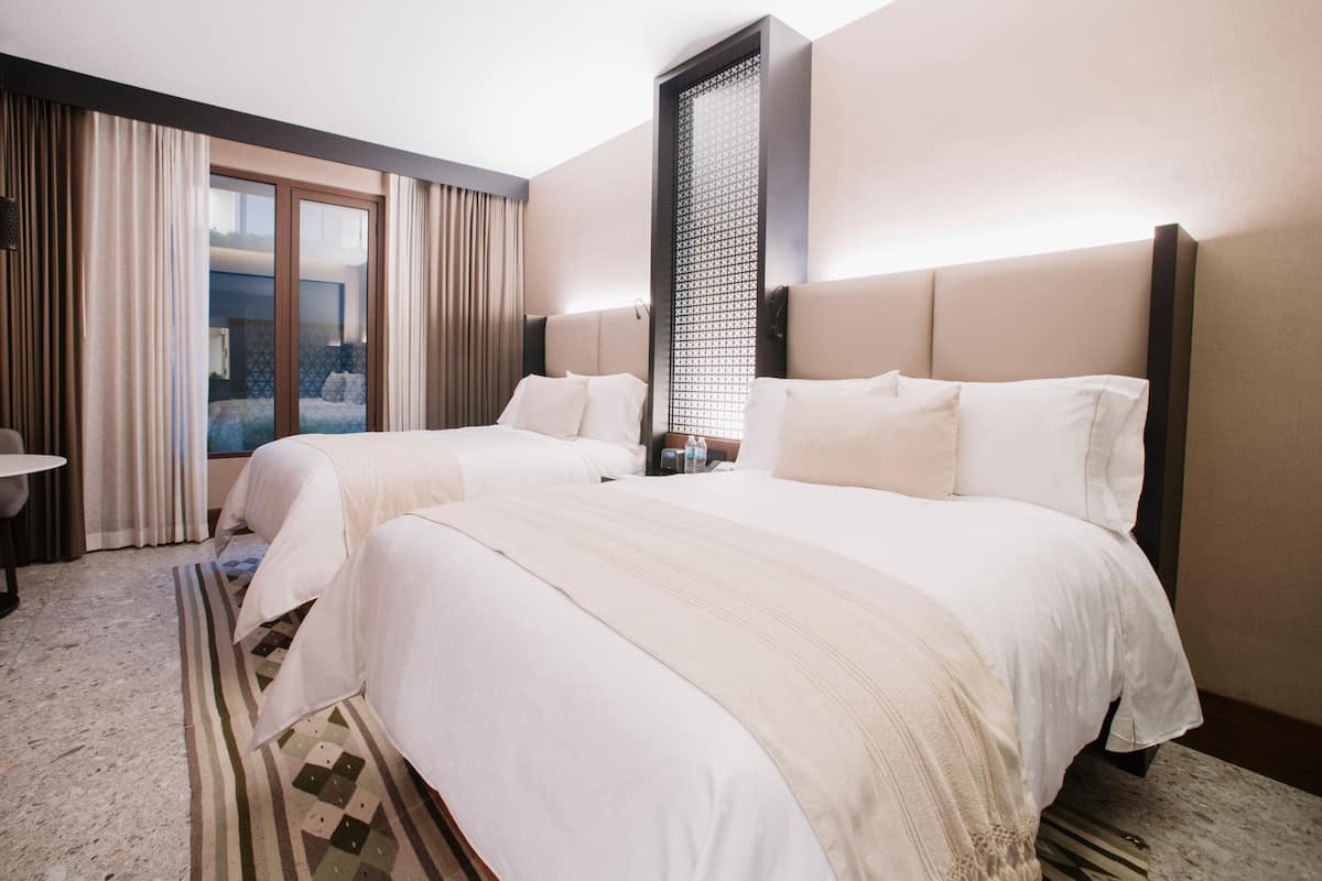Premium bedding, down duvets, pillow-top beds, minibar