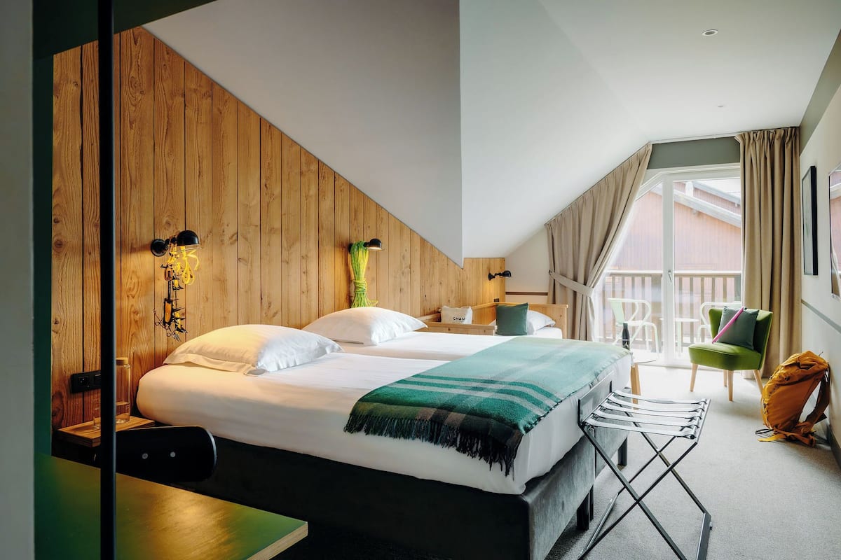 Quarto triplo superior (Vue Mont Blanc) | Cofres nos quartos, individualmente decorados