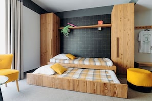 Comfort Quadruple Room, 1 Bedroom, Mountain View | Living area | LCD TV - PlanB Hotel - Living Chamonix (Chamonix-Mont-Blanc)