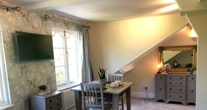 Charming 1 Bedroom Suite in the eaves.