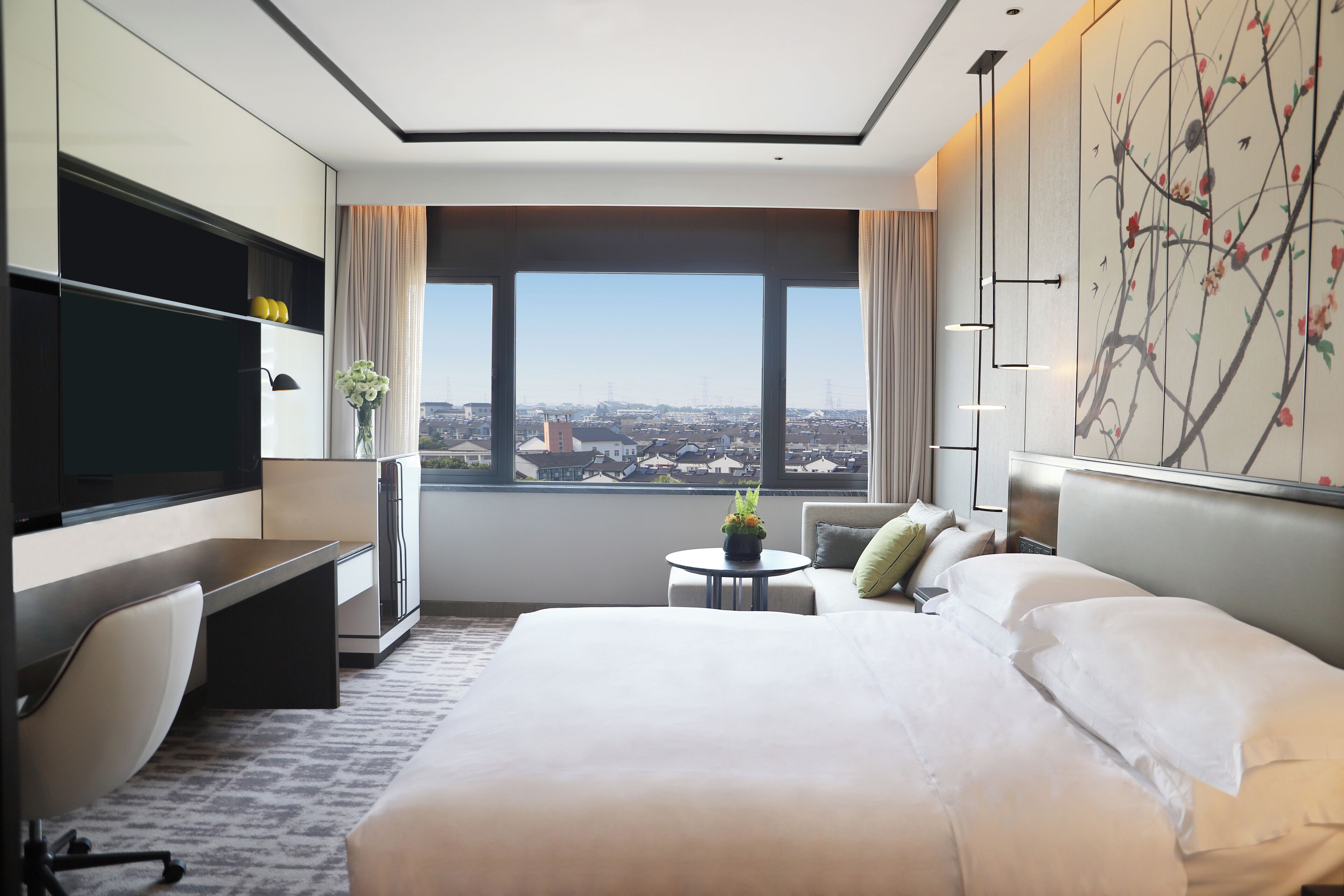 Premium bedding, down comforters, minibar, in-room safe