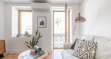 Apartamento, 1 quarto (2B) | Área de estar | TV de tela plana