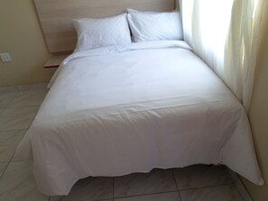 Classic Room | Desk, iron/ironing board, bed sheets