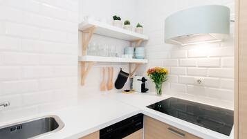 Family Apartment | Private kitchenette | Fridge, microwave, stovetop, dishwasher