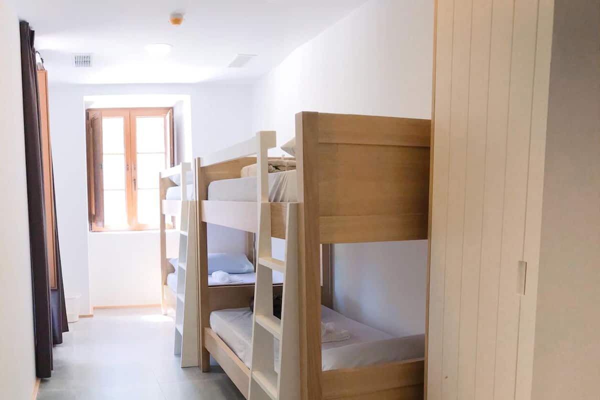 Family Room, Shared Bathroom | Soundproofing, free cribs/infant beds, free WiFi, bed sheets