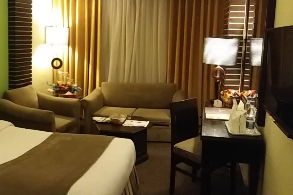 Habitación Deluxe con 2 camas individuales | Minibar, wifi gratis, ropa de cama y acceso para silla de ruedas