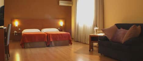 Desk, laptop workspace, blackout curtains, free WiFi