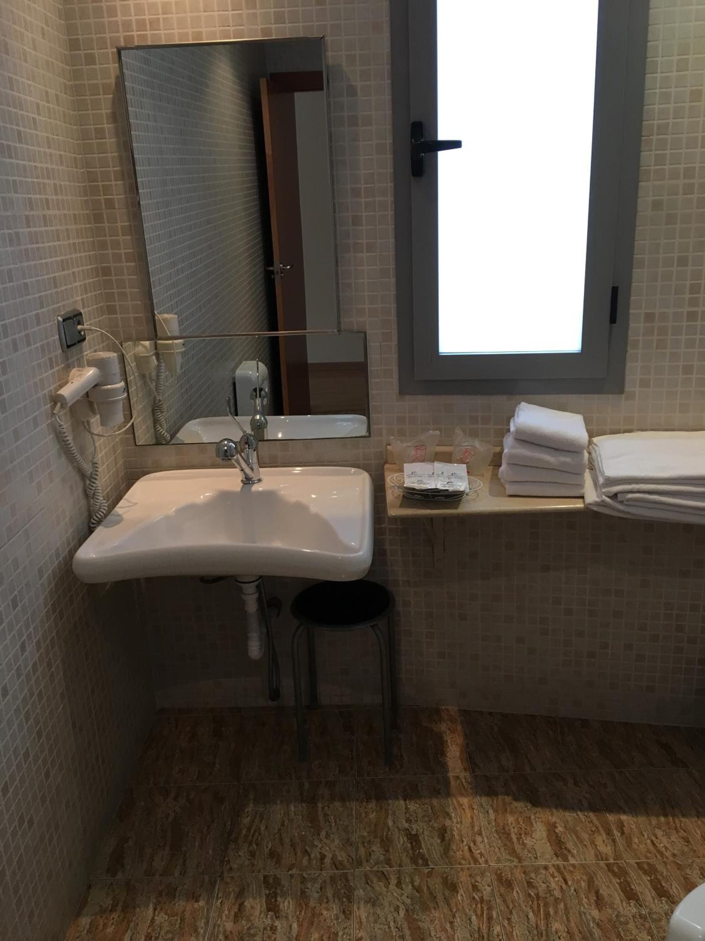 free toiletries, hair dryer, towels