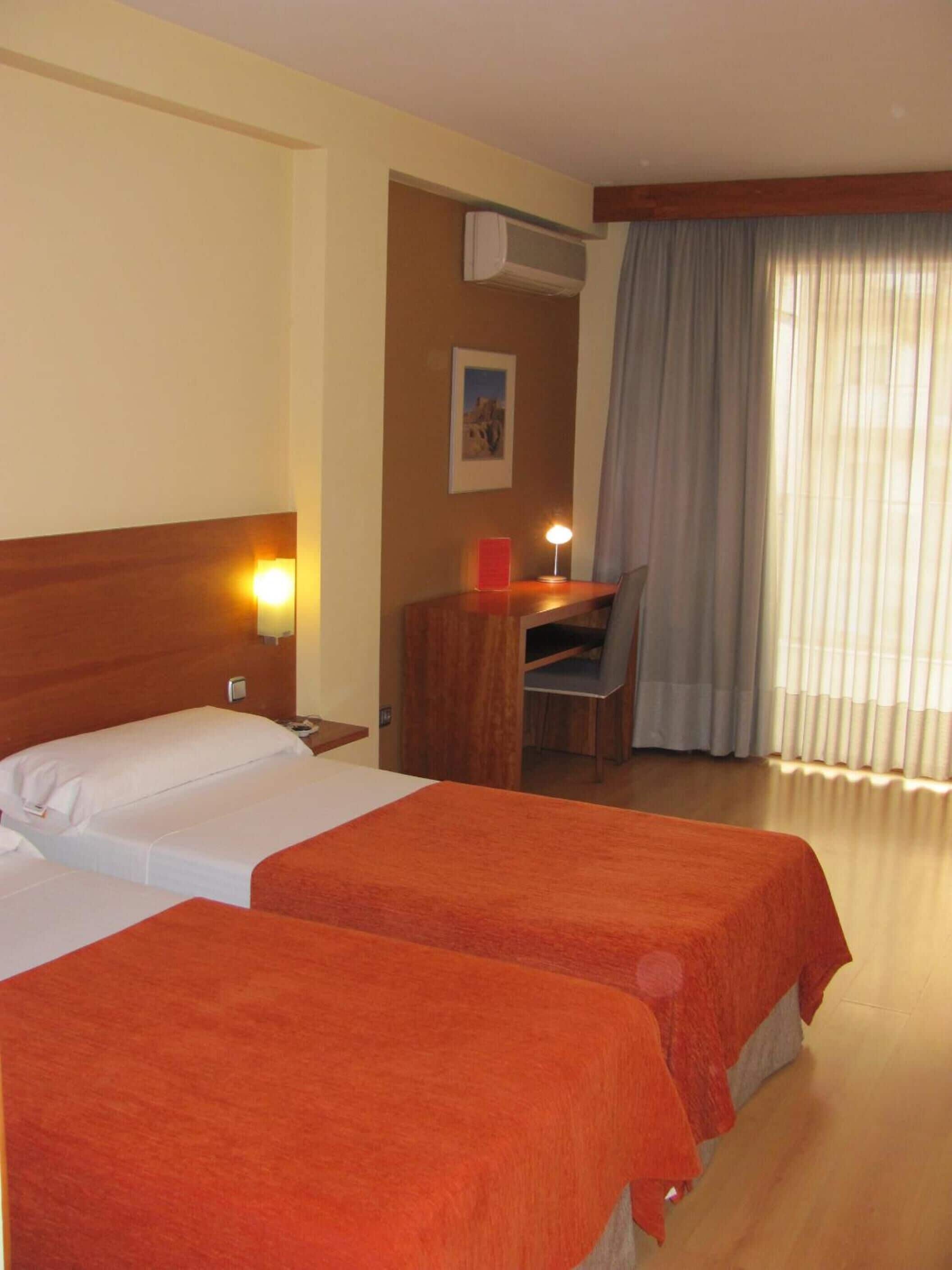 desk, laptop workspace, blackout curtains, free wifi