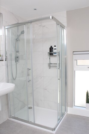 Shower, free toiletries, hair dryer, towels